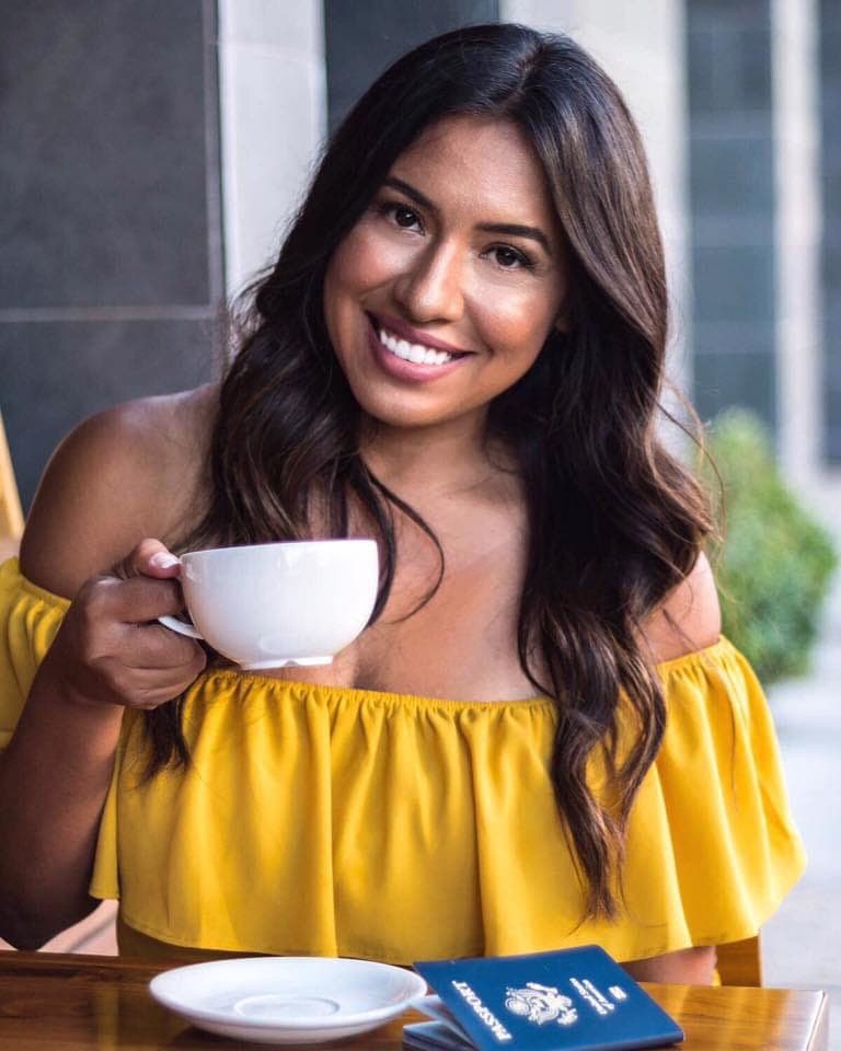Jeannette Ceja with a cup of coffee